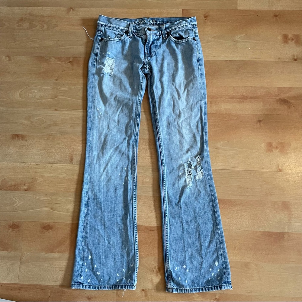 Guess ultra low rise boot cut distressed jean
